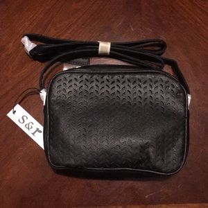 Laser cut detailed crossbody bag!